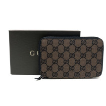 Gucci Portagioie GG Marrone