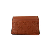 Gucci Portacarte GG Emblem Marrone