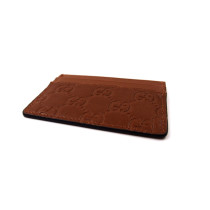 Gucci Portacarte GG Emblem Marrone